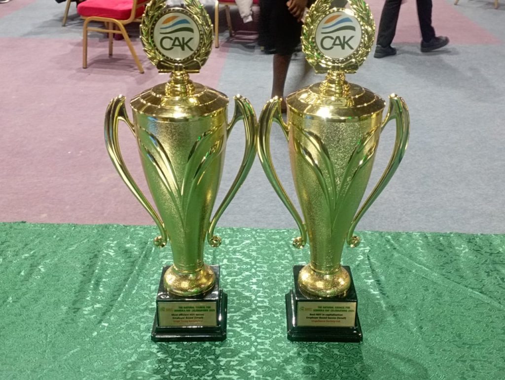 Unga Sacco CAK award trophies on display